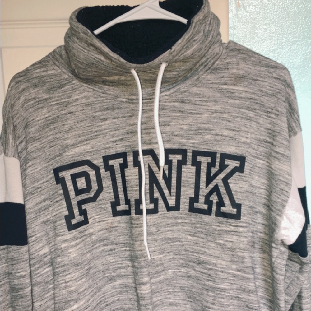 pink hoodie without a hood😂 idk the name